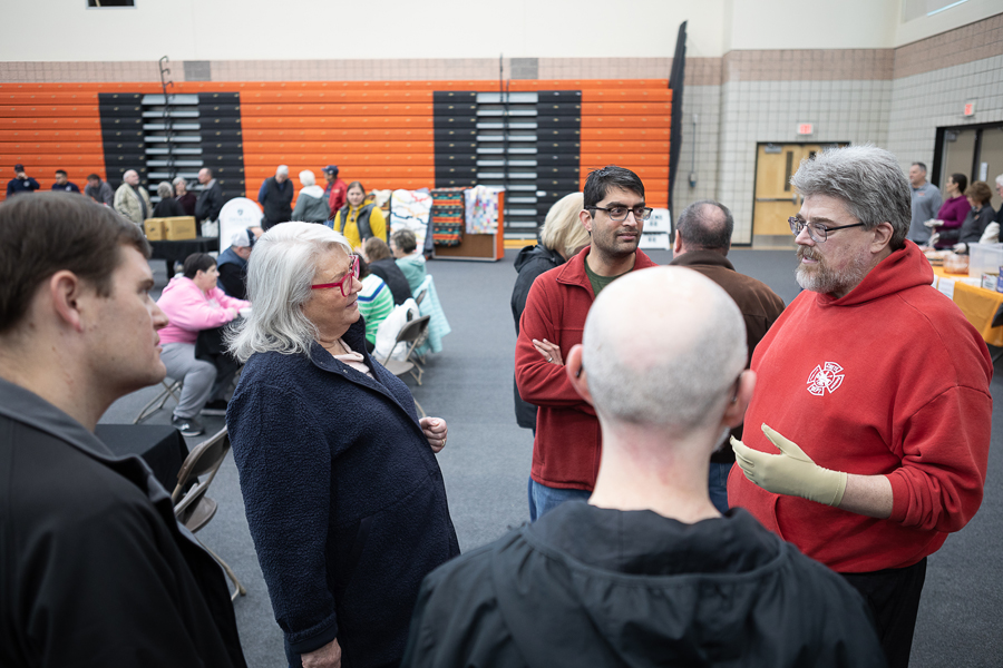 Dr. Brad Elder (far right) speaks with Doane University faculty and staff during a soup and sandwich benefit held by Doane and Crete’s Volunteer Fire Department on Saturday, Feb. 4. The event brought people together from across the region — Doane students, staff and faculty, Crete residents, firefighters from Crete, Wilbur, Lincoln and beyond — and from even further, like Dr. Ramesh Laungani, who traveled to Doane from Brooklyn, New York to congratulate his colleague of 10 years on his recovery. 