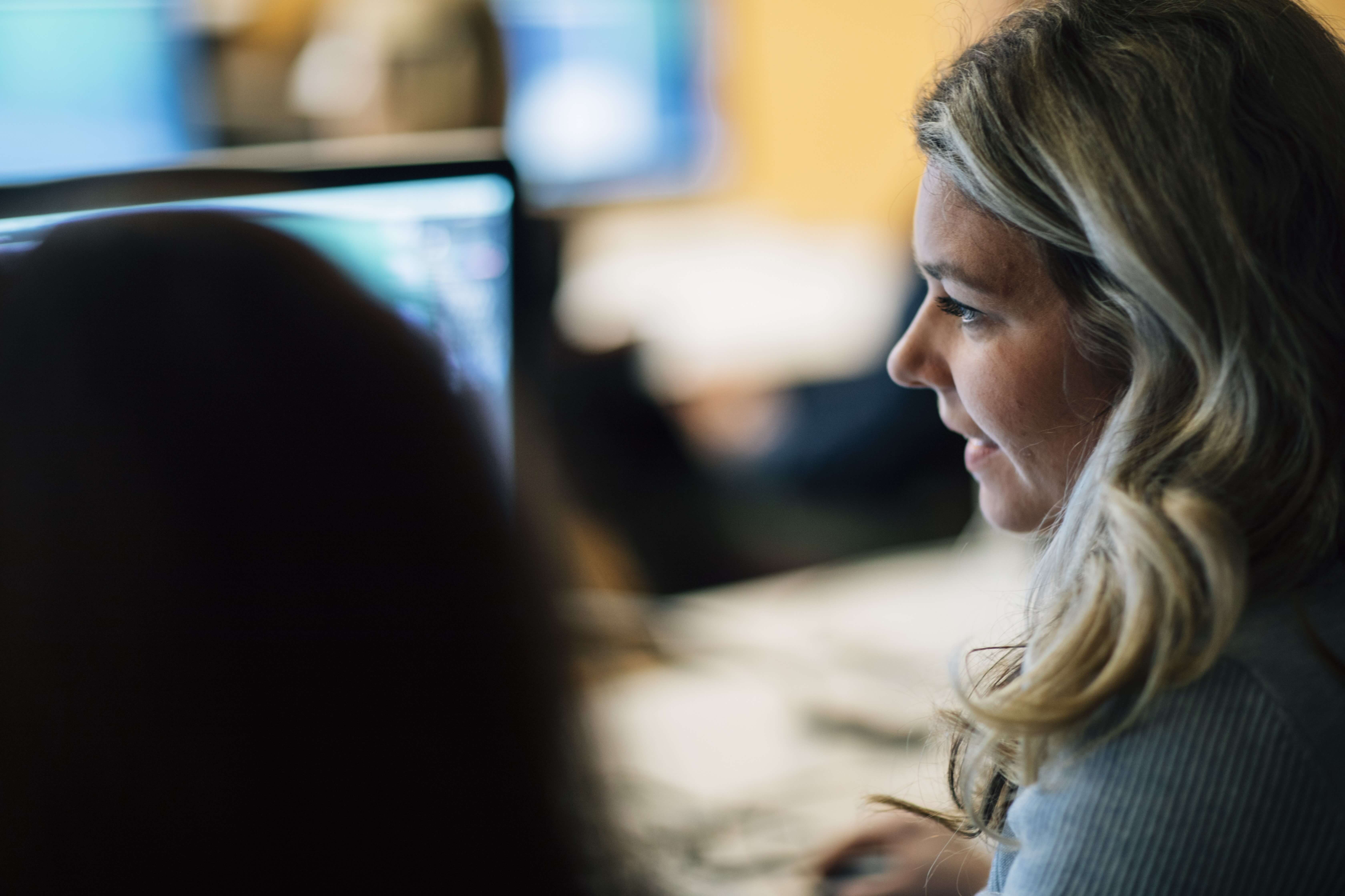 Female student looking at computer screen