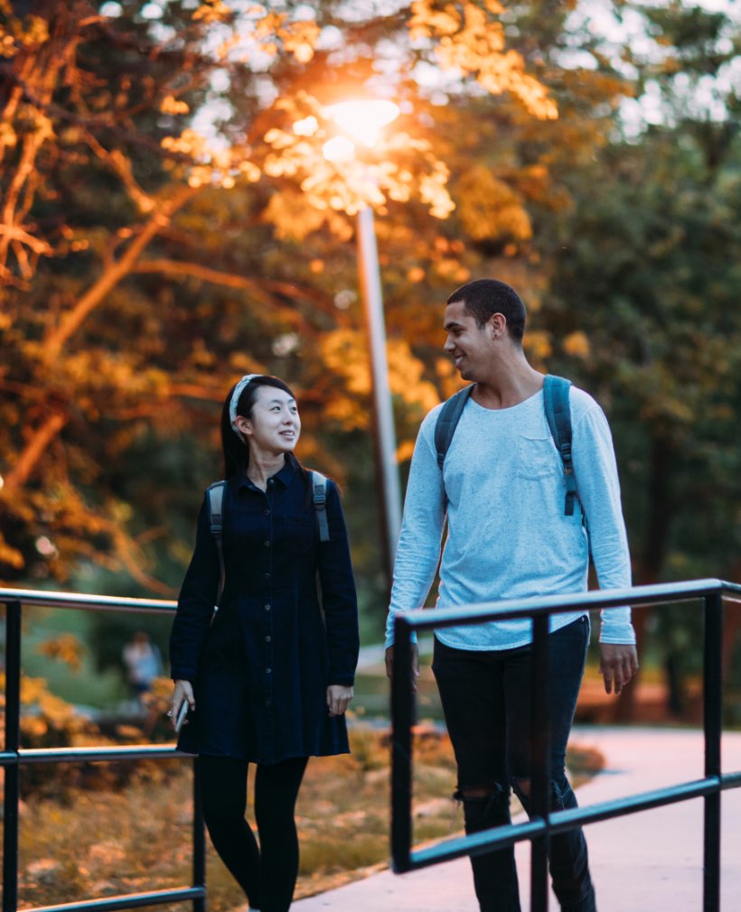 Students walking in fall