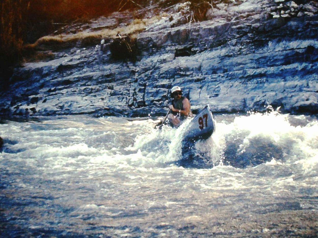 Students navigate rapids on the Rio Grande during an interterm canoeing trip.