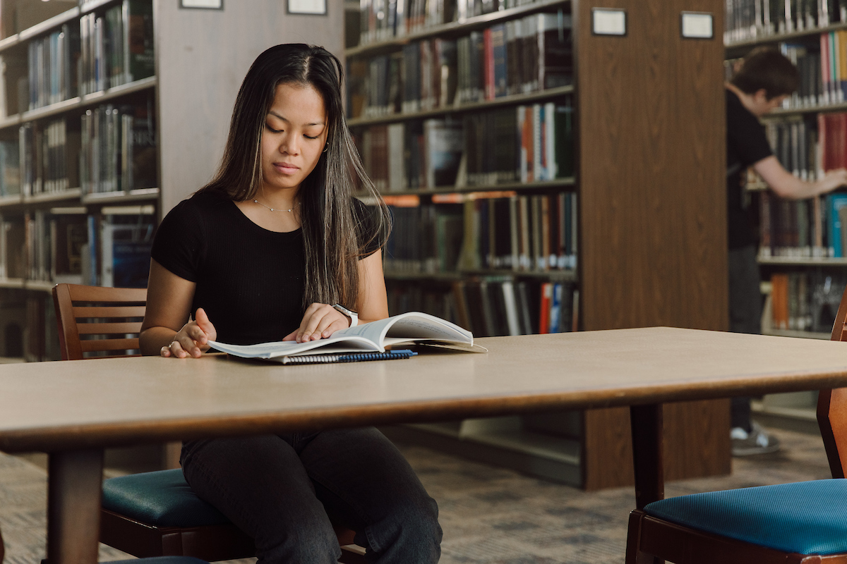 Student studying in Perkins Library