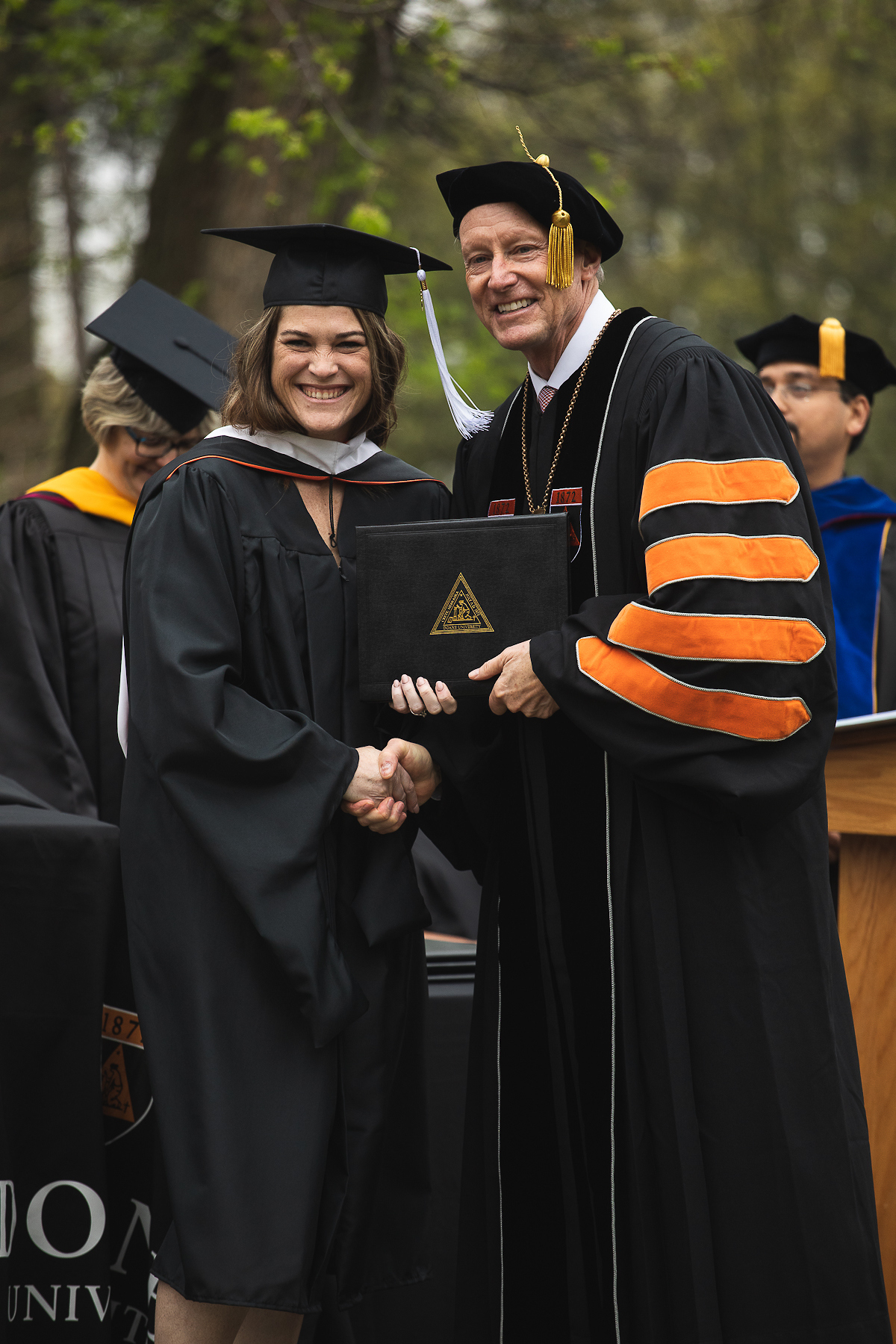 Master of Arts in Leadership Graduate with Roger Hughes at Graduation