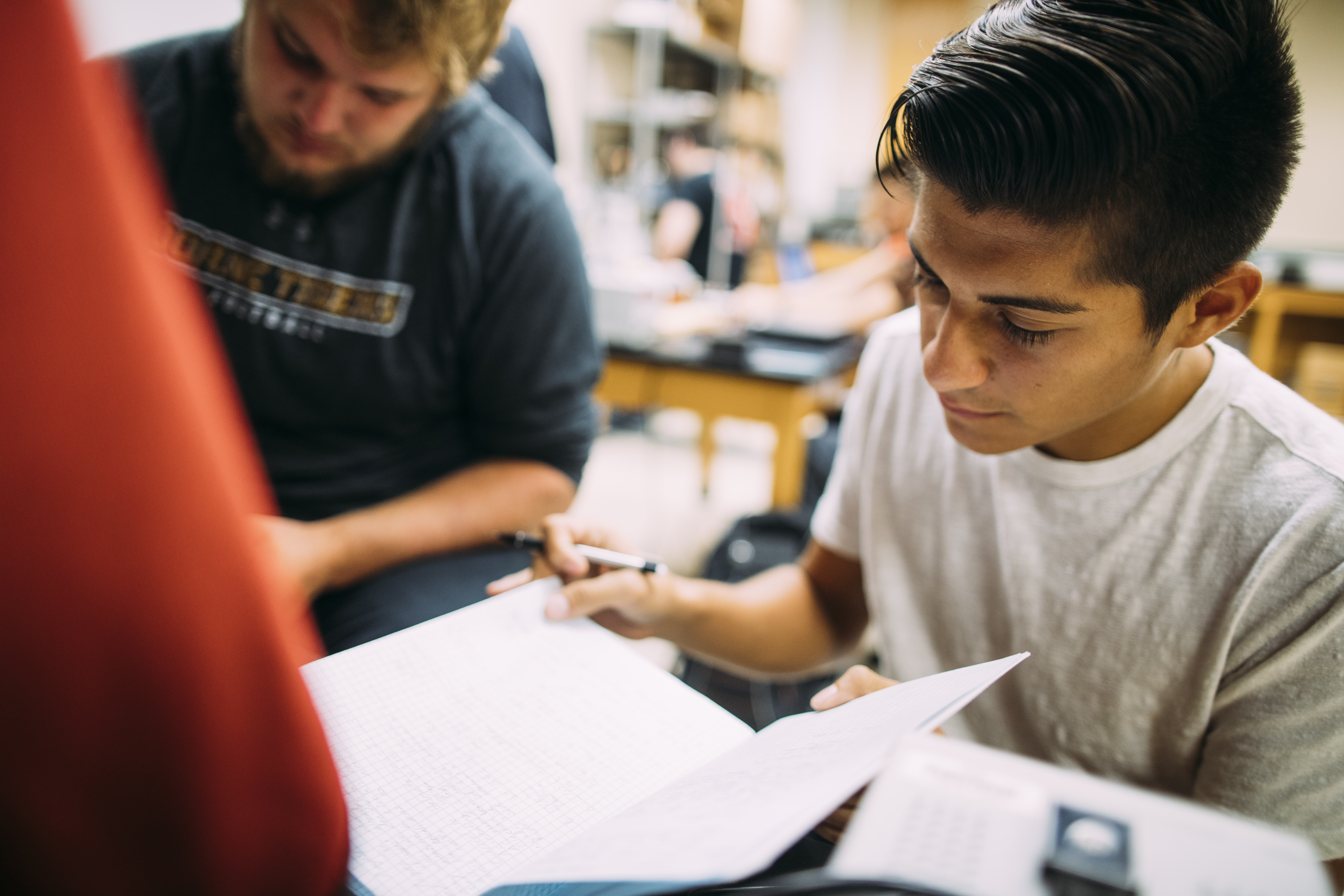 Close up shot of a doane student studying a paper