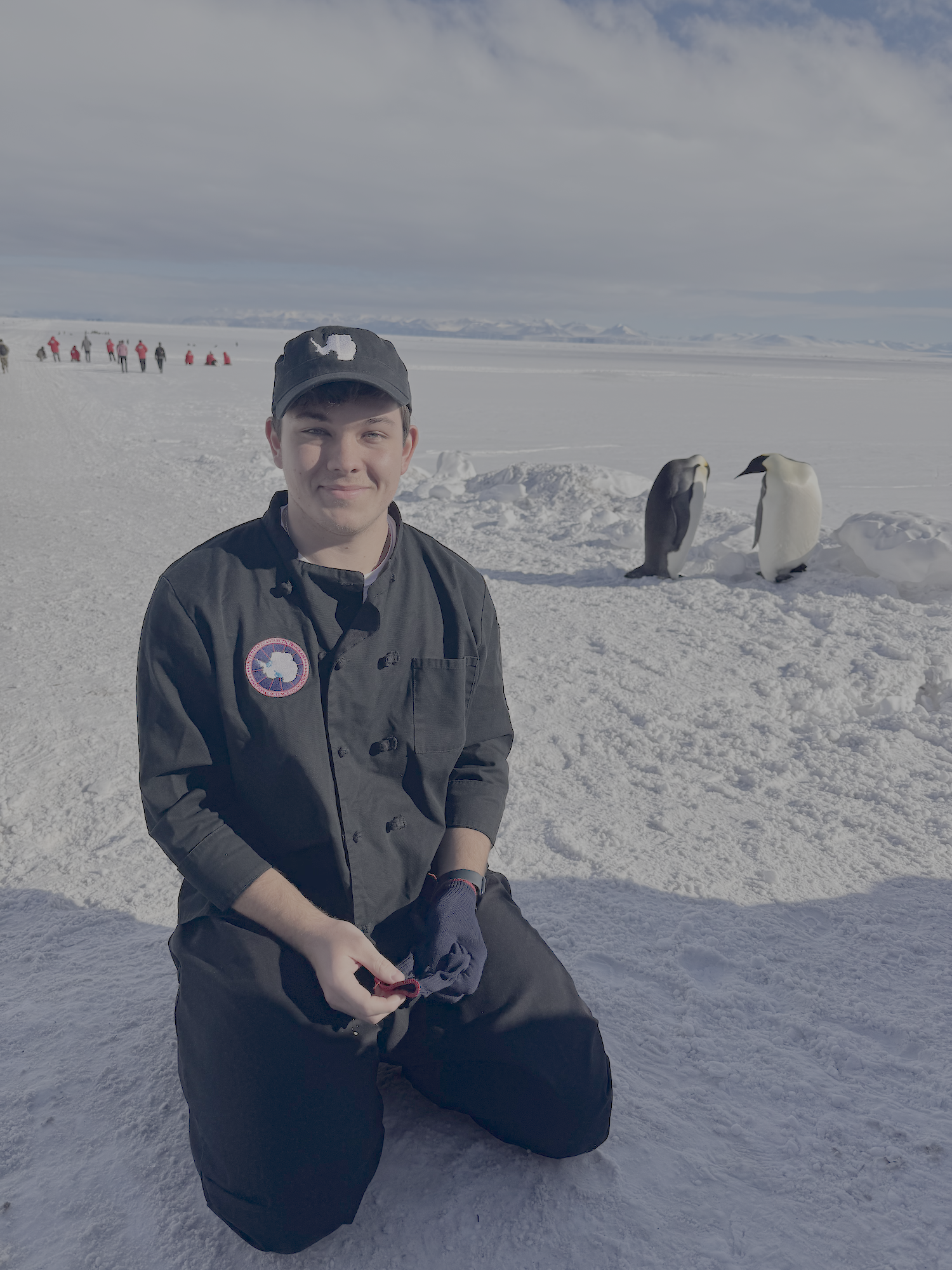 Jared Taylor with penguins