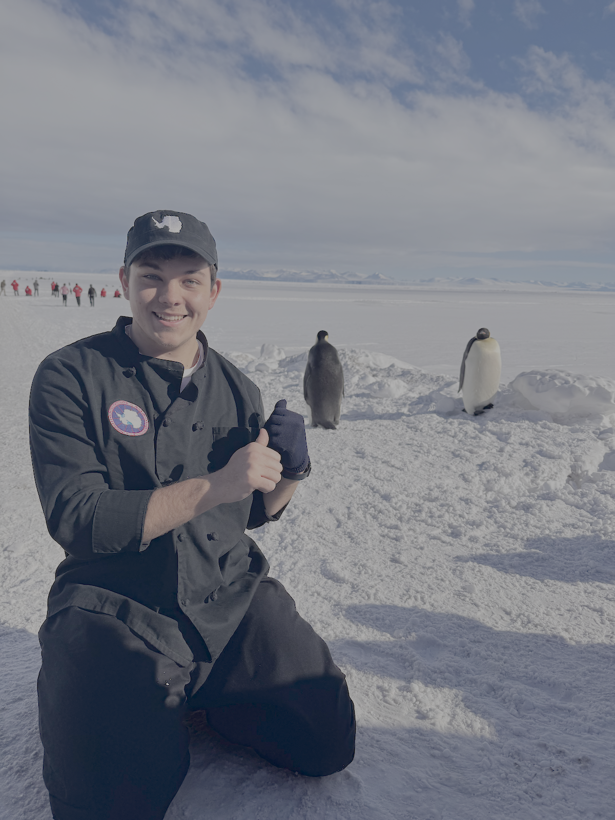 Jared Taylor with penguins