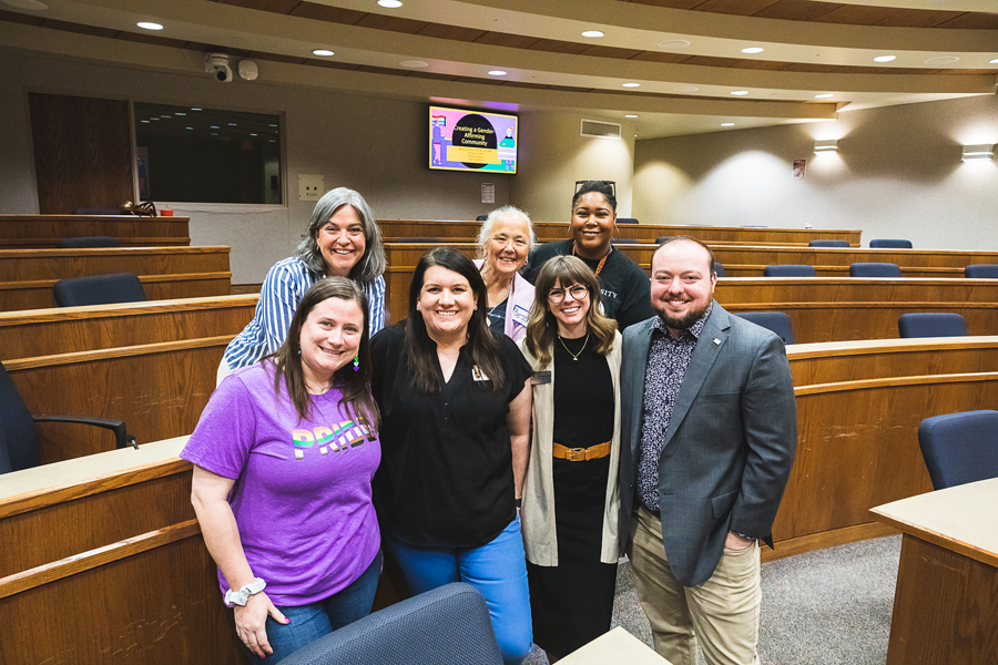 Doane faculty and staff pose with Dr. Mickey White (right) after he spoke on "Creating a Gender-Affirming Community" to students and Doane employees.