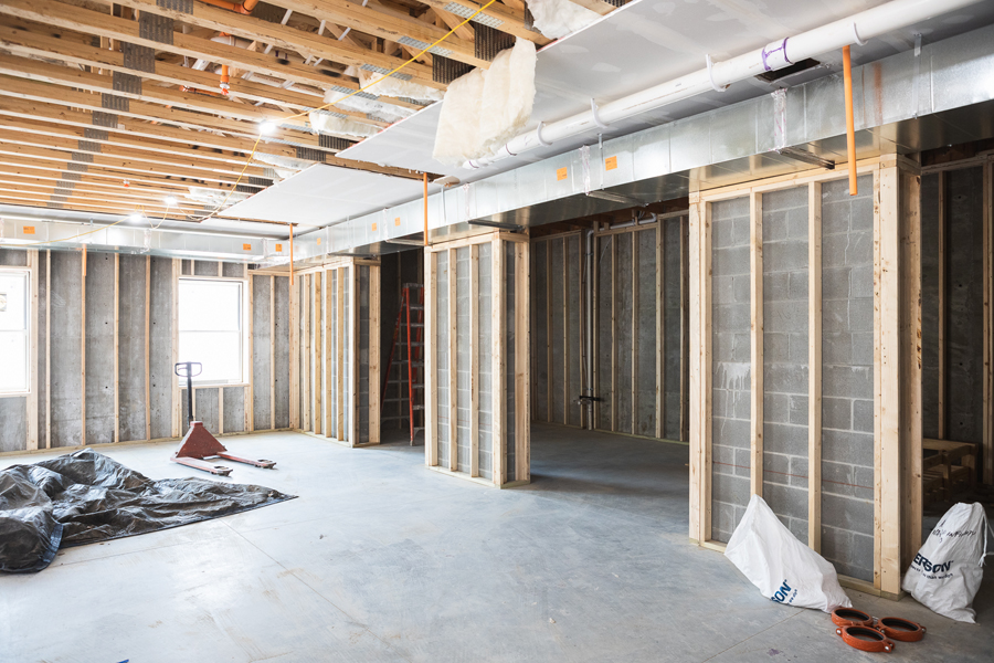 Though currently unfinished, a lounge space in the basement of the new residence hall will also house a full kitchen.