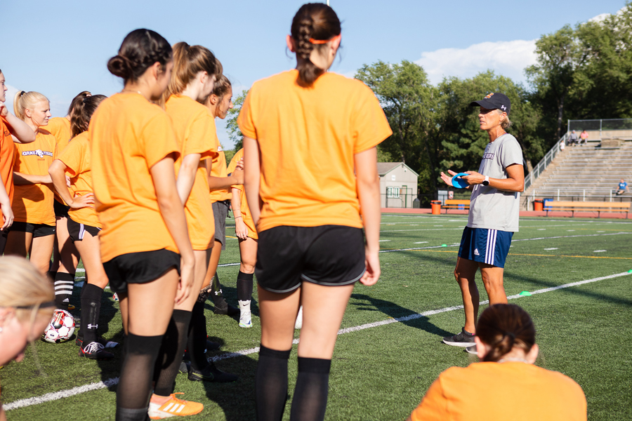 Jennifer Kennedy-Croft addresses her team during a practice.