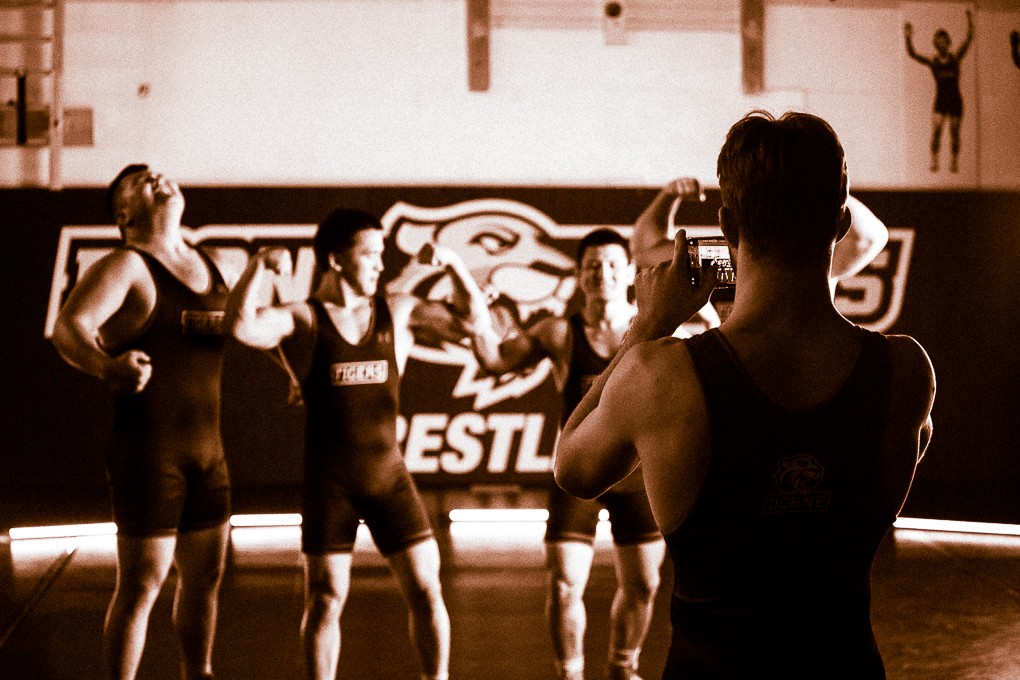 Wrestlers became less camera-shy as the photoshoot went on, posing and doing backflips.