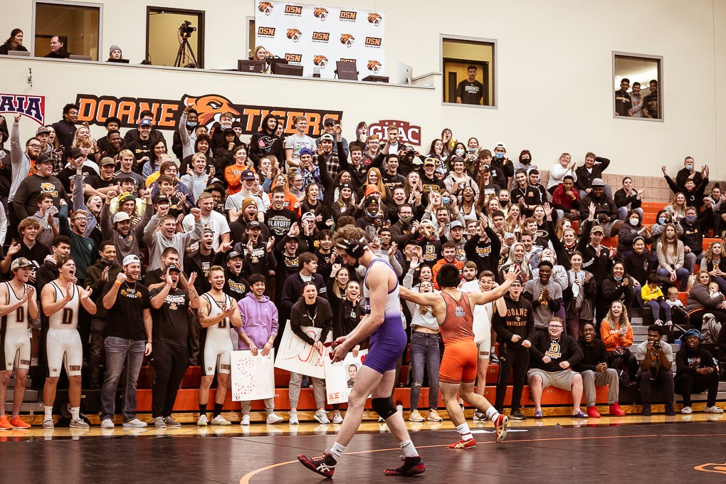 Cheers from the Doane community greet Baagii Boldmaa as he leaves the ring after winning his match in 1:26 minutes.