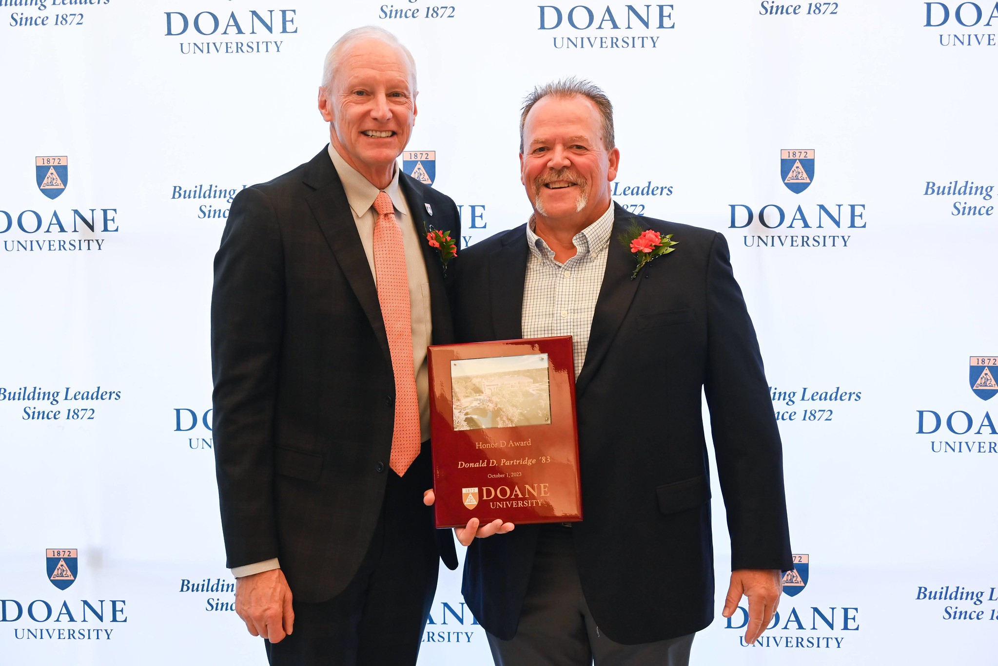 Dr. Roger Hughes stands next to Don Partridge, Honor D award winner.