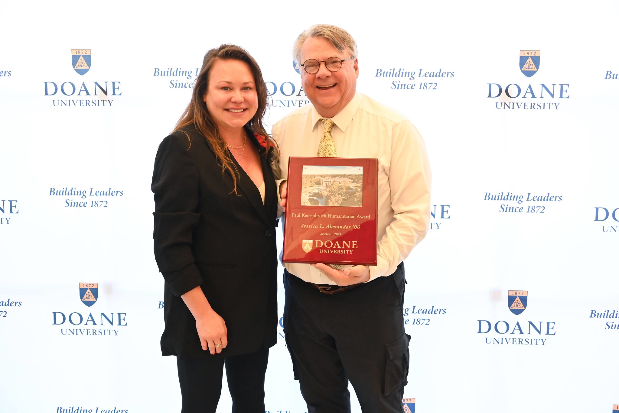 Jessica Alexander Cochnar poses for a photo next to Dr. Rob McKercher, professor of theatre at Doane.