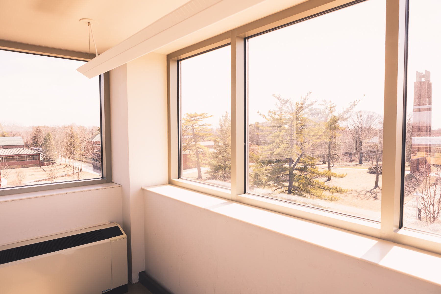 From the fourth floor of Art/Ed, much of Doane's campus can be seen from its nearly 360 degree view windows. The image looks out over Merrill Tower, Padour Walker, Perry Campus Center and Butler Gymnasium.