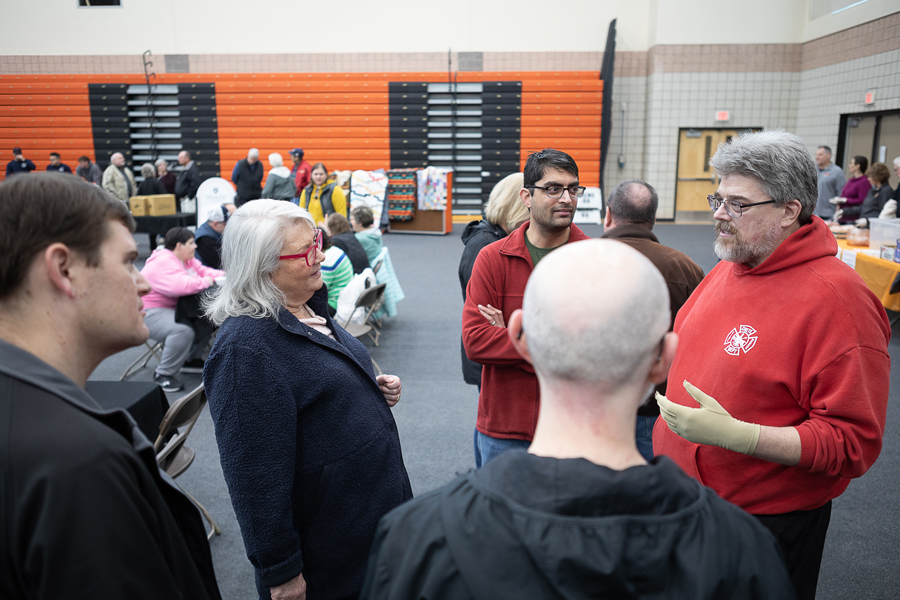 Dr. Brad Elder (far right) speaks with Doane University faculty and staff during a soup and sandwich benefit held by Doane and Crete’s Volunteer Fire Department on Saturday, Feb. 4. The event brought people together from across the region — Doane students, staff and faculty, Crete residents, firefighters from Crete, Wilbur, Lincoln and beyond — and from even further, like Dr. Ramesh Laungani, who traveled to Doane from Brooklyn, New York to congratulate his colleague of 10 years on his recovery.
