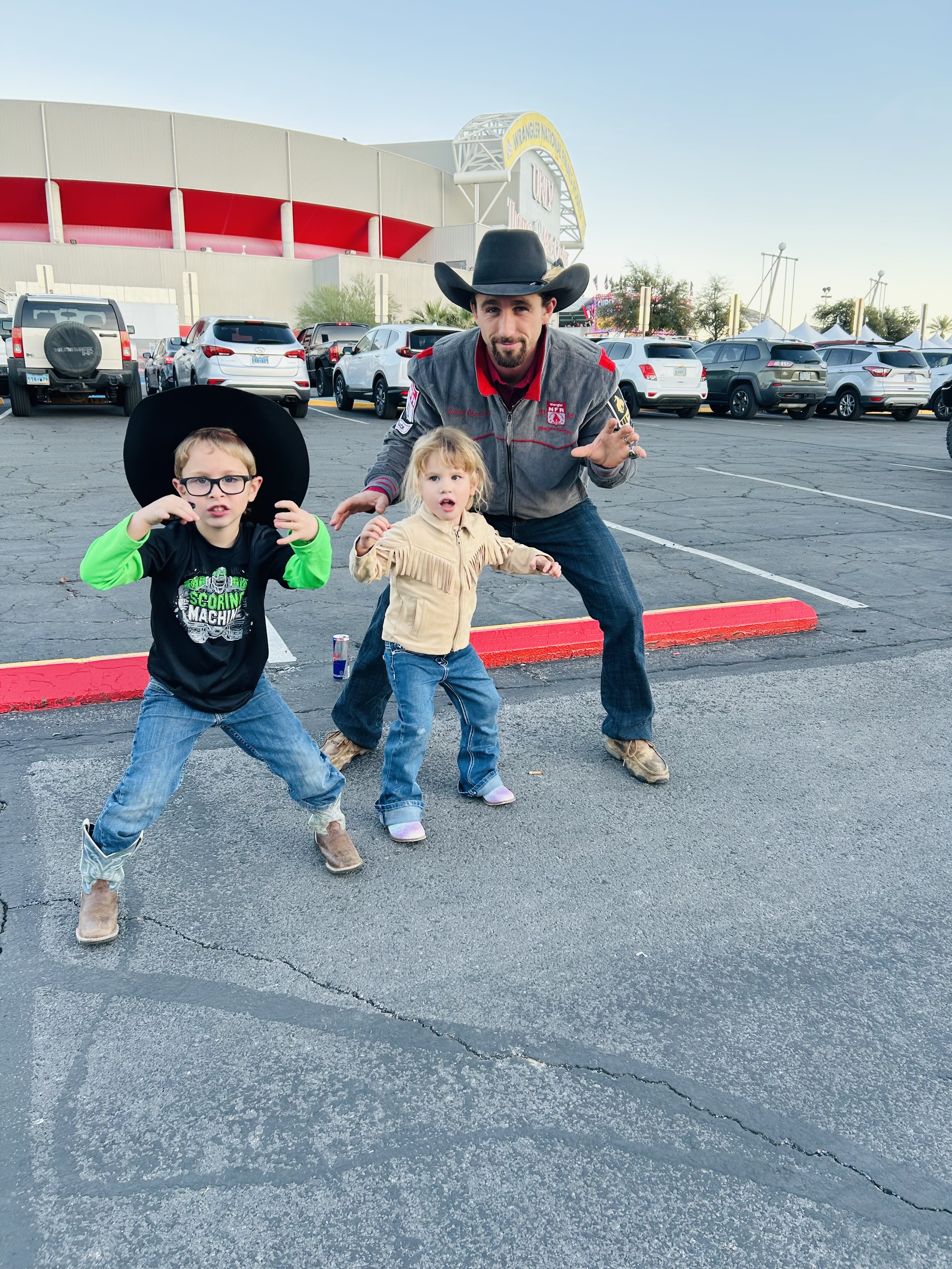Garrett Shadbolt and two of his kids at a rodeo competition