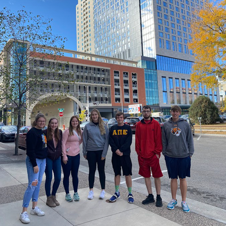 Students pose in Rochester, Minnesota during the Fall 2022 alternative fall break. 