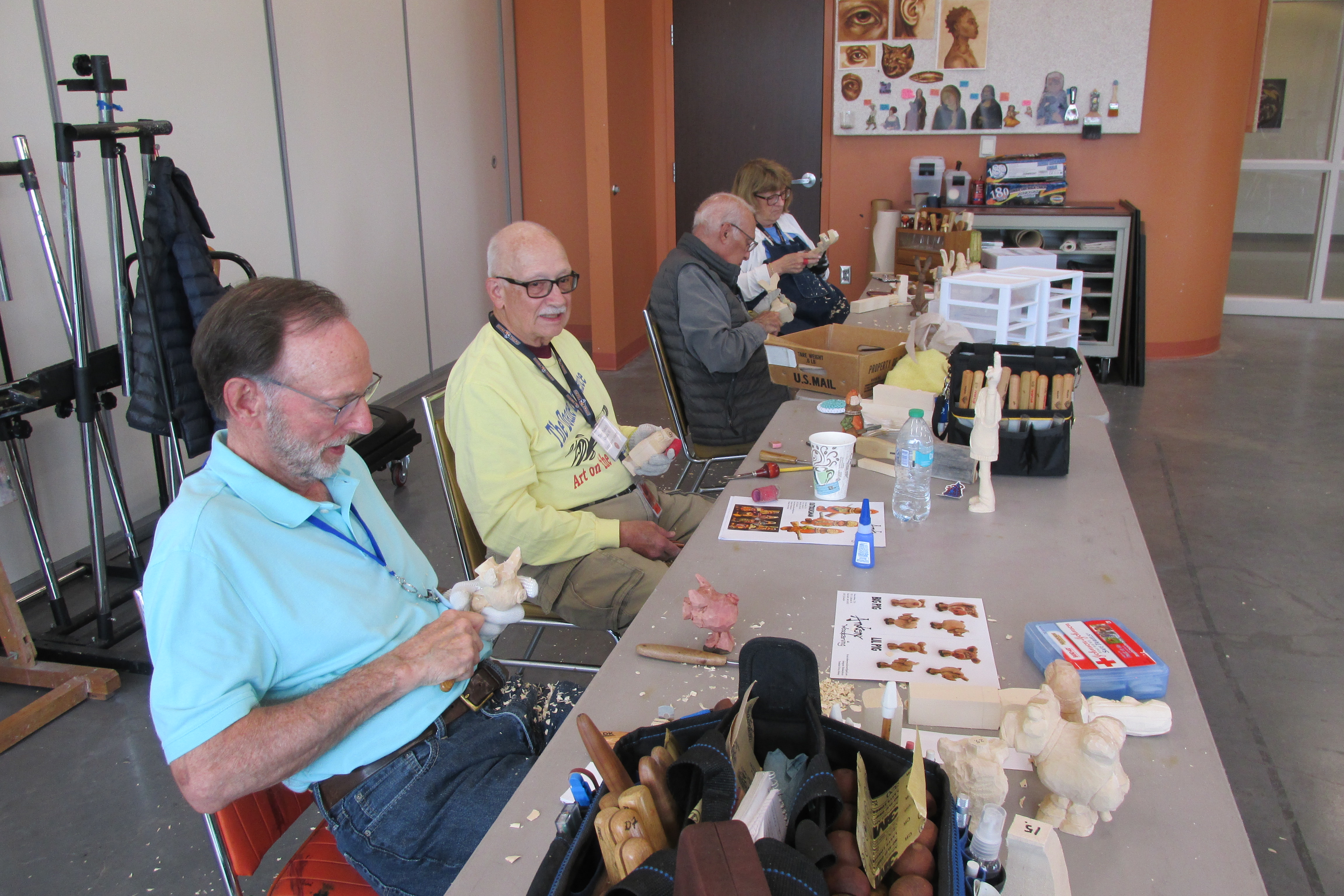 Woodcarvers at the annual camp hosted by Doane