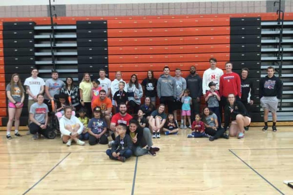 This year’s Unified Doane/Crete Adapted Physical Education Course poses for a picture in the Haddix Center gym.
