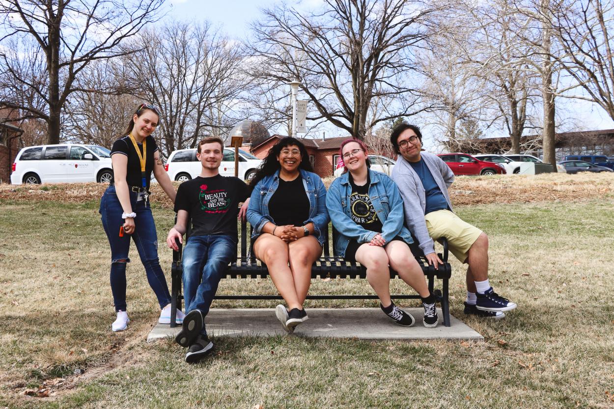 The five members of the Doane Forensics Team pose on a bench on the lawn of the university's Crete campus before leaving for the American Forensics Association National Speech Tournament, held April 1-4 at the University of Nebraska-Lincoln..