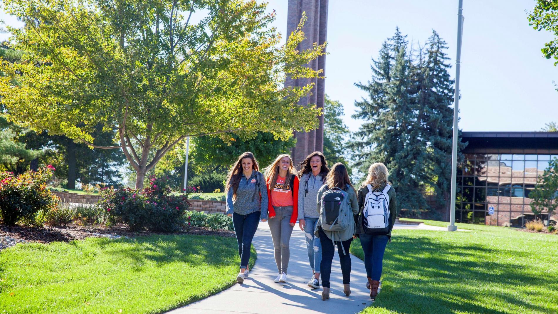 Female students walking on campus