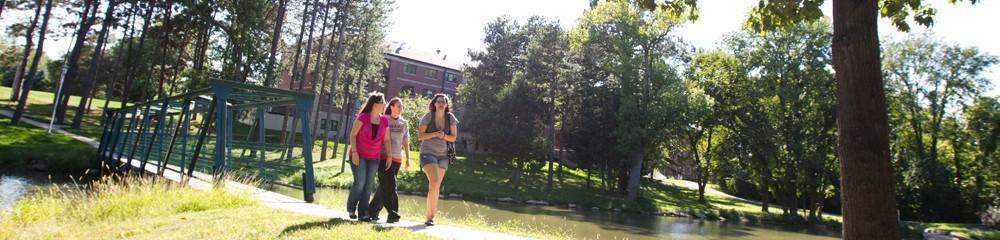 Students walking on a path at Doane University