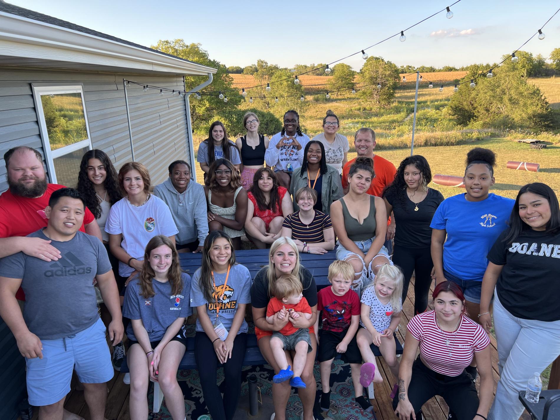 The inaugural women’s wrestling team gathered for a cookout at Dana Vote’s house (Doane Director of Wrestling and men’s head wrestling coach).