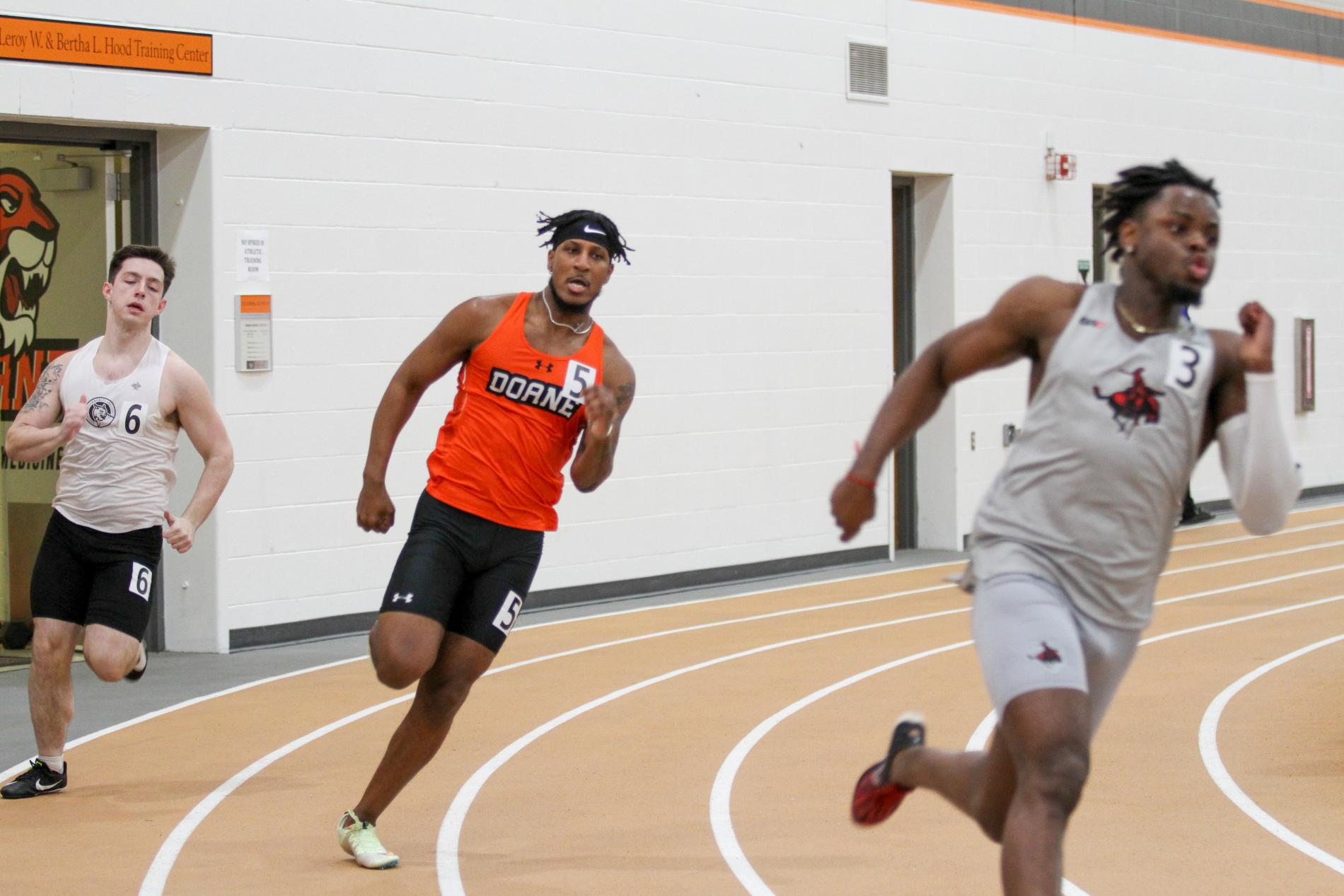 Myles Wheatley runs on the indoor track