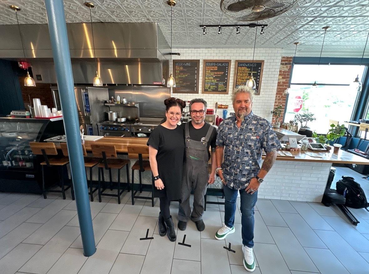 Libby Power-Leybman ’96, her husband Gary Leybman and Guy Fieri