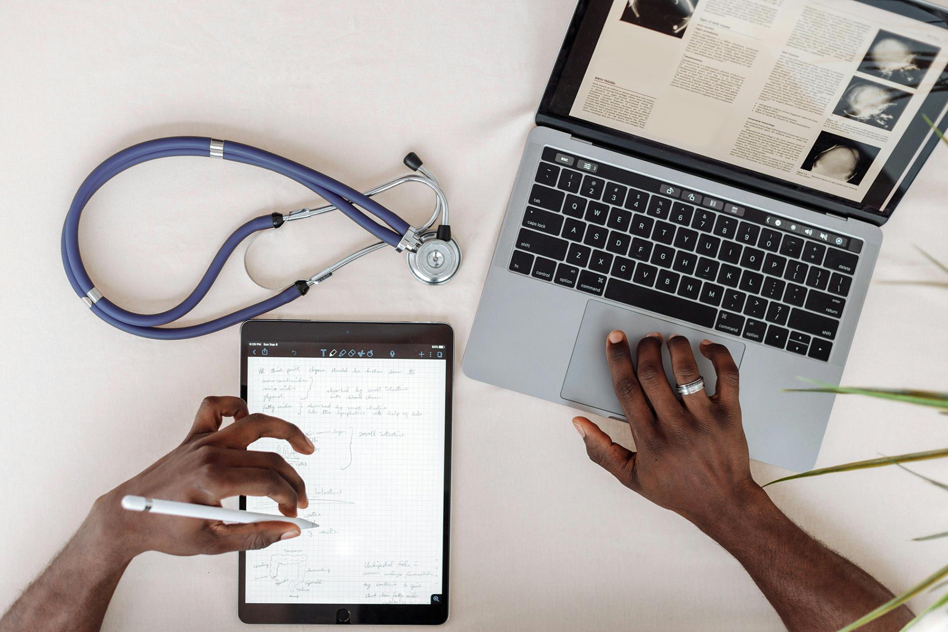 Medical professional taking notes