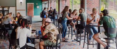 Students socializing in Perry Campus Center