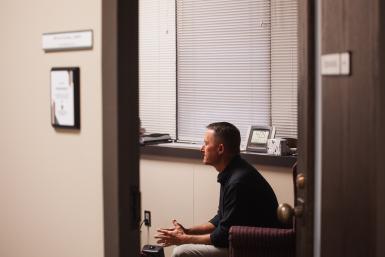 A view from outside his door provides a look at Myron Parsley in his office as he would sit when working with a student. Parsley is a mental health counselor in Doane's Counseling Center, serving students on the Crete campus. 